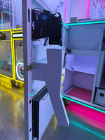 Machine à griffes humaine colorée pour bébés, avec distributeur de pièces, pour la remise de peluches et de prix, jeux d'arcade à prix compétitif