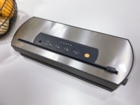 Machine de mise sous vide multifonctionnelle pour la cuisson, avec plaque frontale en acier inoxydable, couvercle amovible et coupe-sacs intégré