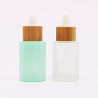 Flacon compte-gouttes rond de luxe en verre de 30 ml avec bouchon à vis en bambou, surface mate, pour cosmétiques et collyres