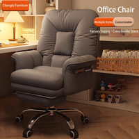 Chaise de bureau ergonomique de direction en cuir motif patte de chat, pivotante avec repose-pieds, base métallique, design moderne et minimaliste, hauteur réglable