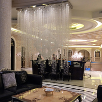 Lustre LED à télécommande à haut rendement lumineux Club-house Hôtel Luminaires suspendus en cristal personnalisés de grande taille