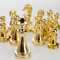Jeu d'échecs de luxe noir et or, pièces métalliques, plateau pliable à motif marbré, personnalisable OEM, vente en gros
