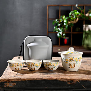 Juego de Té de Viaje Little Yellow Cat Ru Kiln, Una Tetera y Tres Tazas, Juego de Té Kung Fu de Cerámica Portátil, Regalo para Actividades al Aire Libre - Product Image 1