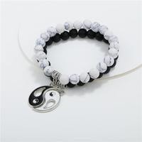 Lot de 2 bracelets élastiques faits main en perles noires et turquoise, avec breloque Feng Shui Yin Yang, pour couple