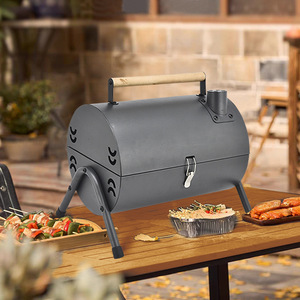 Parrilla Portátil de Carbón de Doble Cara con Función de Ahumador para Uso en Exteriores y Camping - Product Image 2