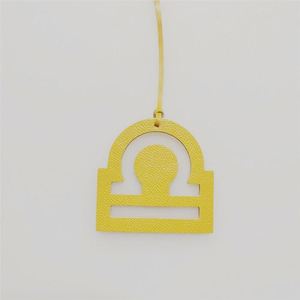 HR Libra Zodiac Symbol PU Leather Handmade Creative Design <b>Bag</b> <b>Charm</b> Multi-color Astrology Pendant Handbag Car Key Gifts - Product Image 2