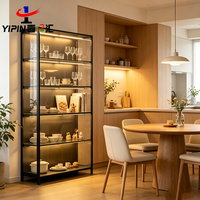 Vitrine moderne en verre transparent sur pied avec éclairage pour figurines et modèles de jouets, pour le rangement - Utilisation domestique dans le salon