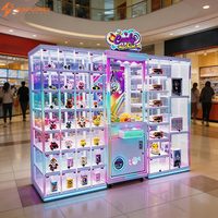 Meilleur Prix : Armoire de Présentation Double pour Jouets Surprise, Bonbons et Machines à Grappin, Machine de Jeu d'Arcade à Monnayeur pour Primes