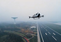 Porte sectionnelle coulissante électrique à grande portée pour hangar de drone, isolation thermique, finition acier, entrepôt industriel, double hangar