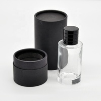 Flacon en verre transparent personnalisé OEM de haute qualité 30ml/50ml/100ml, avec pulvérisateur à pompe, pour soins capillaires, imprimé sérigraphié, dans un coffret cadeau cylindrique de luxe