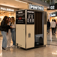 Machine de photomaton commerciale à déclencheur automatique avec écran tactile, idéale pour les photomaton en acier inoxydable pour les fêtes et activités de plage.