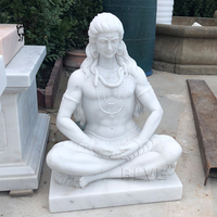Statue de Shiva en marbre grandeur nature, assis sur la tête d'un tigre, décoration extérieure célèbre