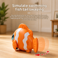 Jouet éducatif sensoriel Poisson-clown avec lumière et musique, jouet électrique rampant anti-collision pour bébés, tout-petits et enfants