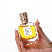 Flacon de parfum en verre ovale élégant de 30 ml, 50 ml, 100 ml avec bouchon embossé et emballage en boîte, en stock
