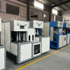 Machine de soufflage de bouteilles PET semi-automatique à 2 cavités et 4 cavités avec composants Mitsubishi PLC AirTac, entraînement par moteur, économique et durable - Product Image 4