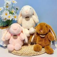 Peluches lapins à longues oreilles Kawaii en coton, jouets en gros pour machines à griffes d'arcade et designs personnalisés