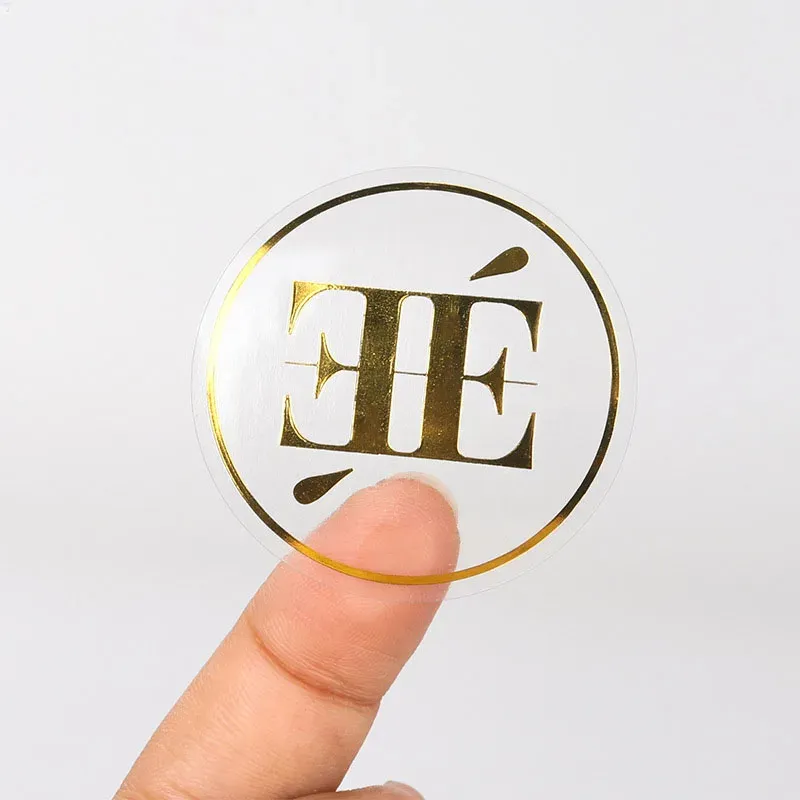 Etiquetas Autoadhesivas personalizadas Impresión personalizada Logotipo transparente Impermeable Hoja de oro transparente Tarro cosmético Etiqueta adhesiva redonda