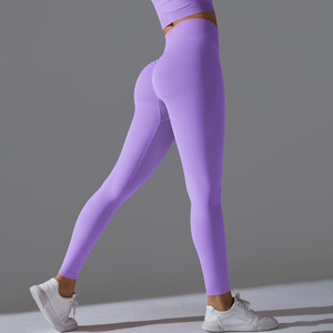 Pantaloni da Yoga a vita alta pantaloni da ginnastica pantaloni senza cuciture da donna abbigliamento Fitness di alta qualità