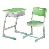Ensemble de bureau et chaise d'étudiant réglables modernes avec structure métallique et surface de travail en plastique pour salle de classe