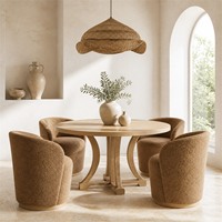 Ensemble de salle à manger rond extensible vintage moderne en chêne clair avec pieds arqués et chaises en tissu blanc pour les intérieurs de villas et d'hôtels