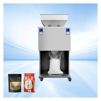 Machine de remplissage et d'emballage semi-automatique électrique multifonctionnelle de haute précision pour poudre d'engrais alimentaire et de graines et noix de 5000g