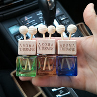 Vente en gros d'arôme vide clair parfum de voiture bouteille en verre 8ml 10ml bouchon en bois vis joint voiture désodorisants emballage diffuseur bouteille