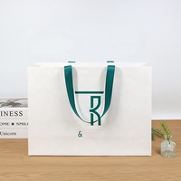 Sac en papier de luxe pour bijoux, parfums et petits cadeaux, avec poignées en ruban