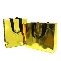 Sac en papier de luxe noir pour boutique de soie, nouveau design, avec logo personnalisé, pour emballage cadeau