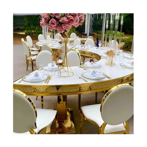 Mesa y Sillas de Comedor de Vidrio Templado Blanco para Eventos de Boda, con Patas de Acero Inoxidable Doradas en Forma de Serpentina - Product Image 1