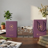 Vente en gros de flacons de parfum vides en verre de la marque Fairy, 30 ml/50 ml/100 ml avec pulvérisateur à pompe, boîte estampée à chaud, modèle FR653-2