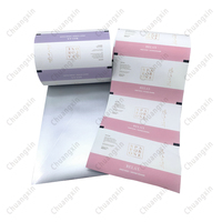 Rollo de película de embalaje automático Flexible laminado de papel de grado alimenticio arcoíris con impresión de gradiente personalizada de fábrica