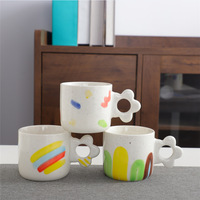 Tasse à lait de couleur pure avec poignée épaisse en céramique de style japonais moderne tasse à café créative pour boire au bureau conception simple