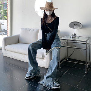 Jean en denim personnalisé pour <span class=keywords><strong>femme</strong></span>, taille haute, <span class=keywords><strong>coupe</strong></span> large, avec superposition jupe portefeuille, ourlet à franges brutes, effet délavé et usé - Product Image 3