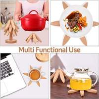Ensemble de dessous-de-plat créatifs et écologiques en bois naturel, tapis isolants pour casseroles et poêles chaudes sur la table à manger