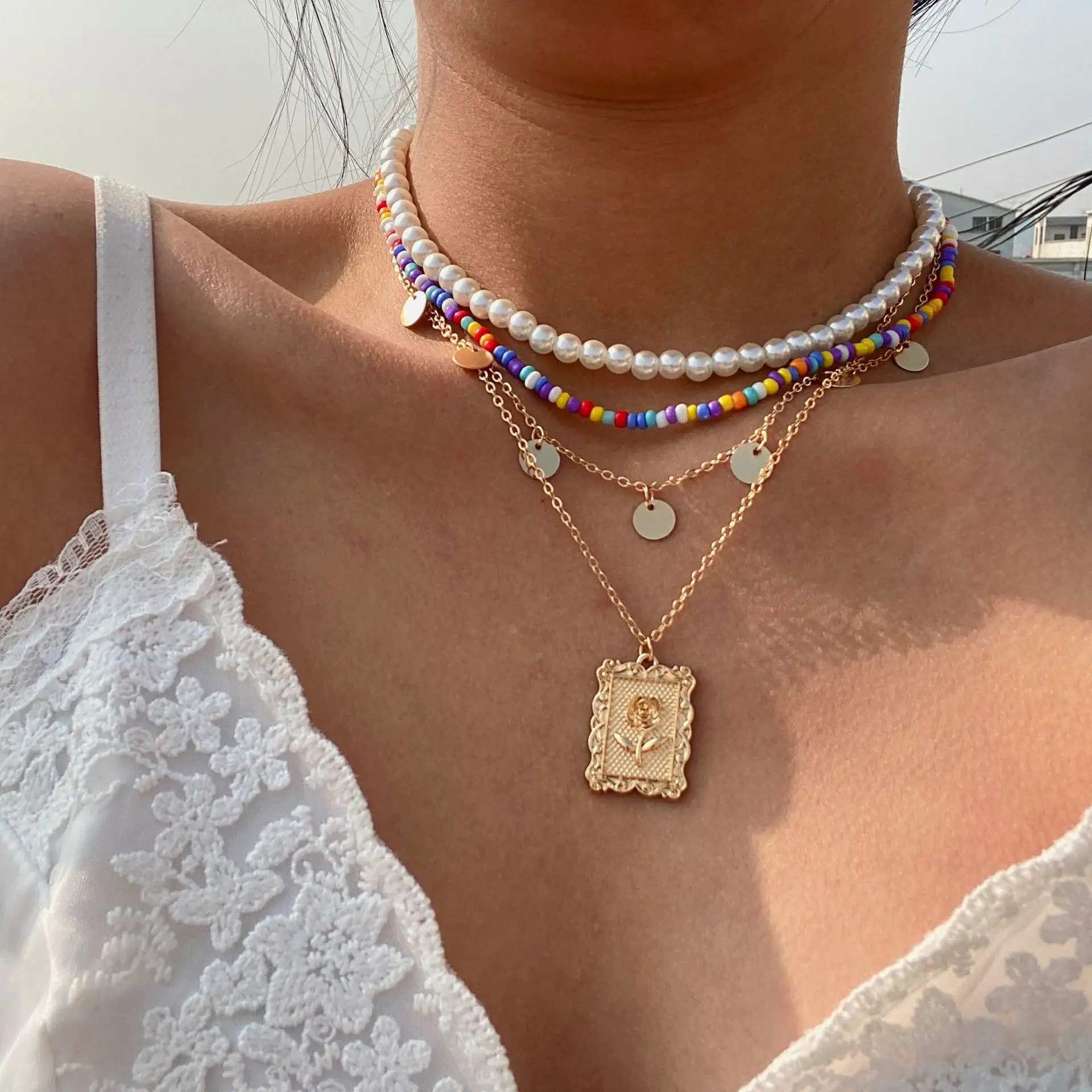 Collana personalizzata creativa all'ingrosso Set collane di gioielli di moda di perle con ciondolo a catena di paillettes per le donne