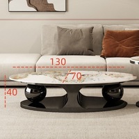 Table basse ovale en pierre légère de style italien, table d'appoint double boule de luxe léger et simple pour la maison, combinaison tendance