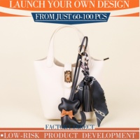 Breloque de sac chat OEM&ODM, pendentif chat en cuir avec nœud et pompon en soie pour sac à main, accessoire de décoration quotidienne à suspendre sur l'extérieur du sac