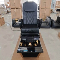 Fauteuil de pédicure de luxe noir et or avec dossier à coutures en V, finitions plaquées or, station de massage professionnelle