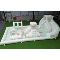 Château gonflable commercial blanc et vert avec toboggan, parc aquatique gonflable humide/sec
