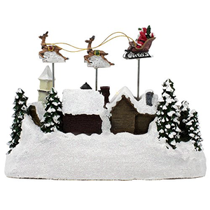 Grande maison de Noël musicale en polyrésine avec scène de traîneau du Père Noël volant, village de Noël avec arbre de Noël rotatif - Product Image 3