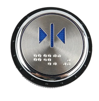 Bouton d'ascenseur sécurisé verrouillable 24V avec rétroéclairage LED, protection IP54, construction en acier inoxydable pour une sécurité à basse tension contrôlée