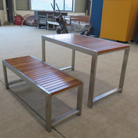 Parc extérieur personnalisé en usine Patio Salle à manger en métal Table de pique-nique Banc en acier et bois restaurant Table de pique-nique et ensemble de chaises