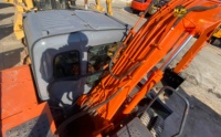 Excavatrice sur pneus Hitachi ZX130W avec peinture d'origine, moteur Isuzu, 13 tonnes, 87,2 kW, haute performance, en stock