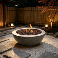 Brasero d'extérieur en béton pour soirées en famille et entre amis, idéal pour garder au chaud le jardin la nuit