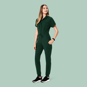 2025 nuevo conjunto de exfoliación médica personalizado para mujeres enfermeras <span class=keywords><strong>Polo</strong></span> cuello Jogger piernas enfermera mono de una pieza conjuntos de exfoliación uniformes de diseño de logotipo - Product Image 1