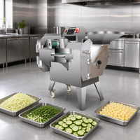 Commerciële roestvrijstalen automatische industriële dubbelkopige groentesnijmachine met transportband voor restaurantkeuken