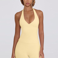 Tops activos de entrenamiento sin costuras transpirables a la moda para mujer Top de Primavera de talla grande PDS incorporado con cuello Halter de compresión