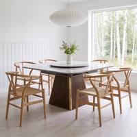 Table à manger extensible, plateau en céramique aspect marbre, pieds en métal doré, style moderne et luxueux, vente en gros