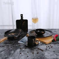 Vente en gros de vaisselle en céramique pour hôtel restauration Marbre noir blanc Caractéristiques durables Tasse à café Bol à salade Assiette plate