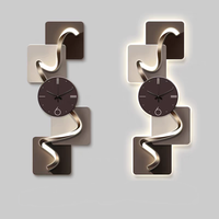 Horloge murale 3D haut de gamme en porcelaine sculptée avec éclairage LED, style mode, vente en gros, excellent rapport qualité-prix